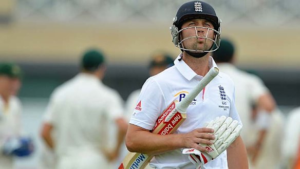 England's Jonathan Trott leaves the pitch after the decision.