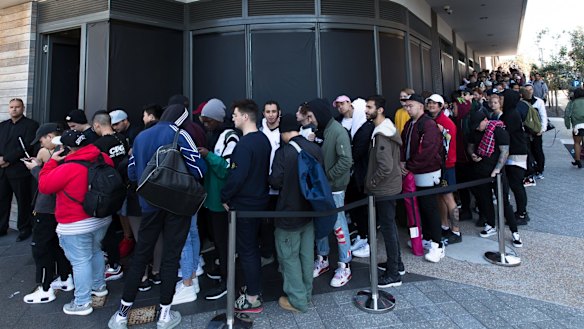 Kanye West fans line up for the opening of his pop up clothing store in Bondi, Sydney. The queues started forming at 6 pm the night before the 10 am opening, with many people paying others to sleep in line for them.
