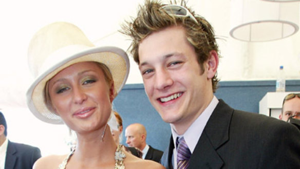 Paris Hilton and former Australian Idol contestant Rob "Millsy" Mills in the Birdcage on Melbourne Cup day in 2003.