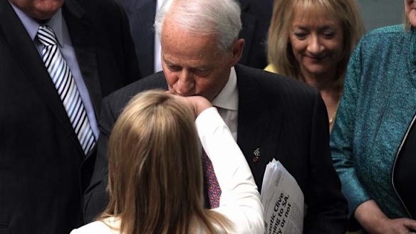 Father of the House Philip Ruddock congratulates the Member for Lindsay, Fiona Scott, after her maiden speech. Photo: Alex Ellinghausen