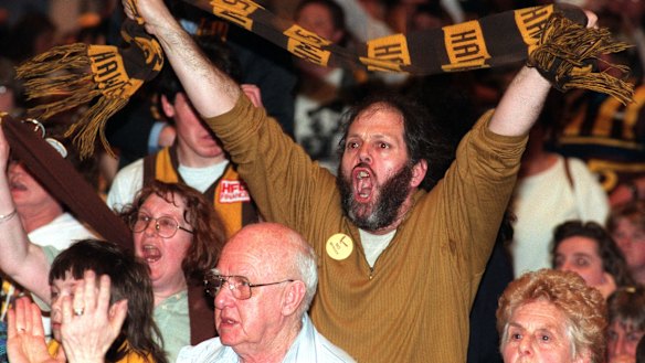 Angry Hawthorn supporters at the merger meeting at Camberwell Civic Centre.