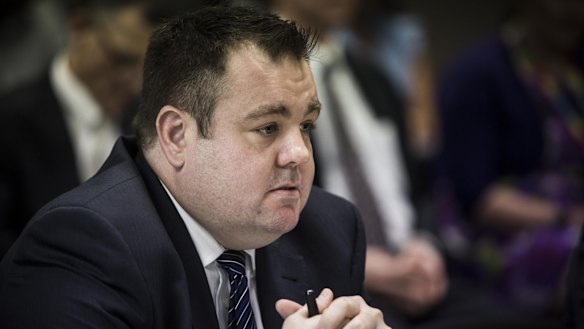 Uber's director of public policy (Oceania), Brad Kitschke , appears before the Corporate Tax Avoidance inquiry on November 18, 2015 in Sydney.