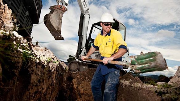 Workers construct the NBN in Tasmania.