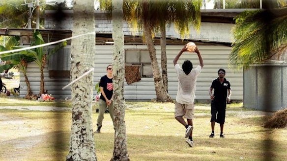 Asylum seekers at Nauru detention centre. A worker at the controversial centre told Fairfax Media that she often saw children sitting on guards' laps late at night.