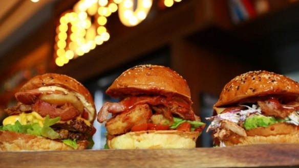 Burgers are generously stacked with buttermilk chicken thigh fillets, deep-fried pork belly and other big fillings.