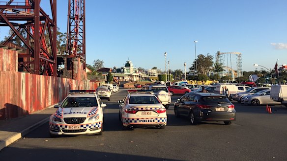 Police and emergency crews remain outside Dreamworld after the horrific accident on the Thunder River Rapids ride.