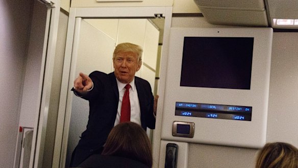 Obama did it: US President Donald Trump speaks to reporters aboard Air Force One before landing in Maryland last week.