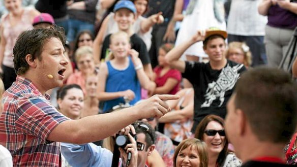 Jamie Oliver speaks to a huge crowd during the Australian Ministry of Food's stint in Ipswich.