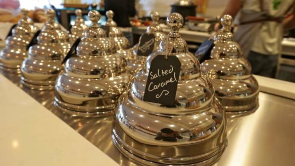 Spectacular chrome domes cover deep barrels of  ice-cream.