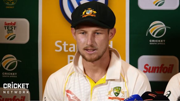 Cameron Bancroft faces the media after being charged with changing the condition of the ball.