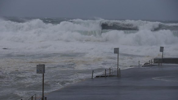 Waves pound the Clovelly Pool on Tuesday morning.