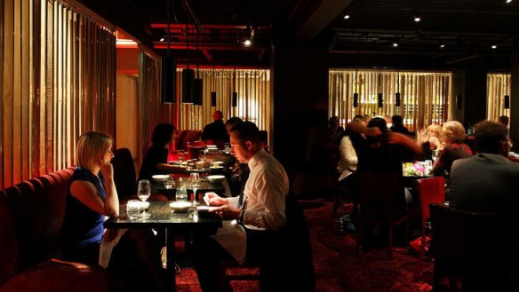 Quality over quantity: The darkly moody interior of Spice Temple Sydney.