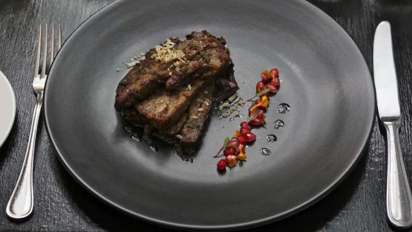 The signature slow-braised lamb with pomegranate kicks off a stylish meal.