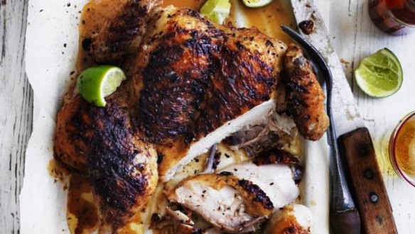 Brined and char-grilled whole chicken with cumin and lime.