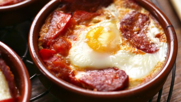 Baked Eggs with tomato, parsley & chorizo.