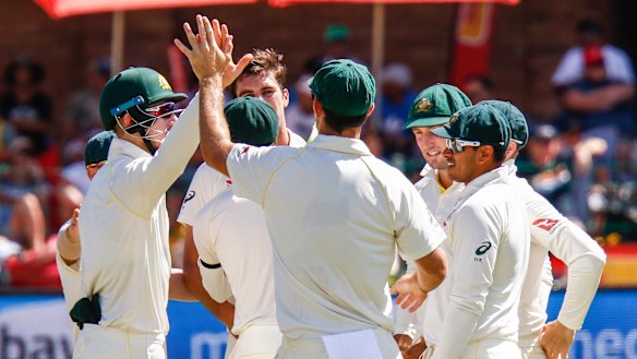 Fiery affair: The Aussies celebrate a wicket in what would be a second Test defeat to South Africa.