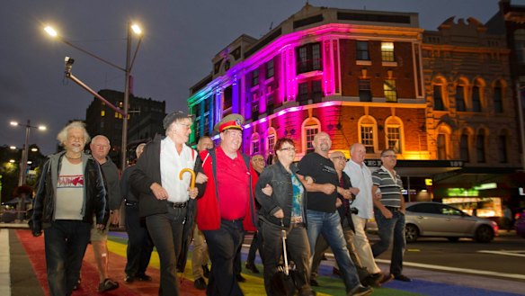 Mardi Gras 78ers celebrate a reunion at the 2013 parade. 