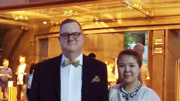 Jeff Sikkema with wife Jiang Ling who he says was ''arrested her for processing visas".