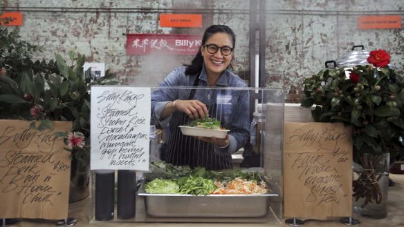 Early start: Kylie Kwong dishes up steamed pork buns at Eveleigh markets.