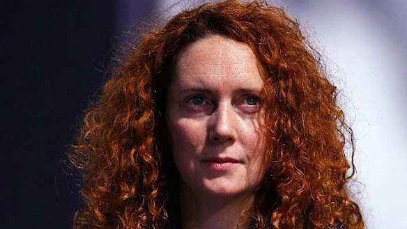 Rebekah Brooks ... James Murdoch is standing by her.