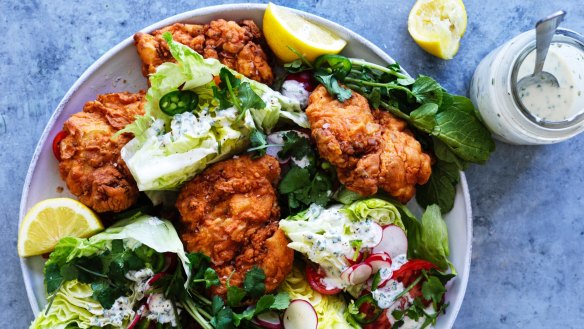 Buttermilk fried chicken cutlets with iceberg wedges, jalapeno and coriander dressing.