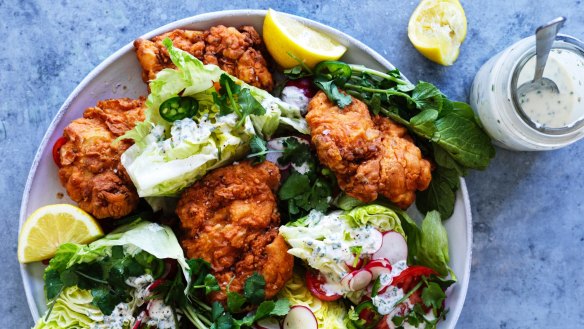 Buttermilk fried chicken cutlets with iceberg wedges, jalapeno and coriander dressing.