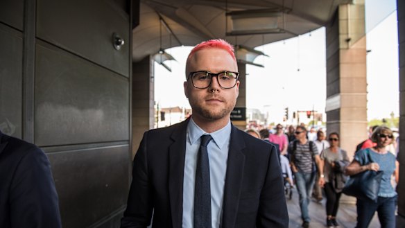 Christopher Wylie, a whistleblower and former employee with Cambridge Analytica, leaves after attending a parliamentary select committee with Alexander Nix, former chief executive officer of Cambridge Analytica in London, UK.