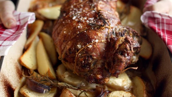 Roast stuffed lamb with parsnip and potatoes.