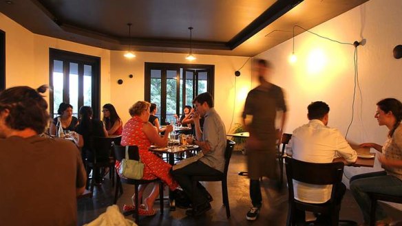 Bleak chic: The dining room at Moon Park in Redfern.