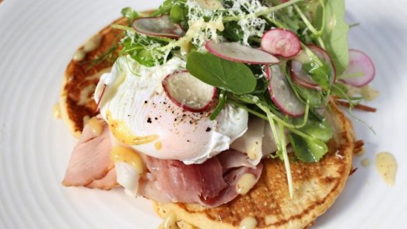 Poached egg and patato pancakes.