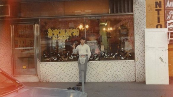 Sometime on the 'late afternoon' of April 24, 1986 having just received the keys and with champagne in hand, Mario Maccarone stands outside what is now Marios.