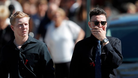 Mourners leave the funeral of Meadow Pollack, a victim of the Wednesday shooting at Marjory Stoneman Douglas High School, in Parkland, Florida. 