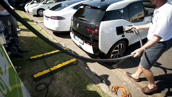 Filling up at an electric vehicle charging station in Brisbane.