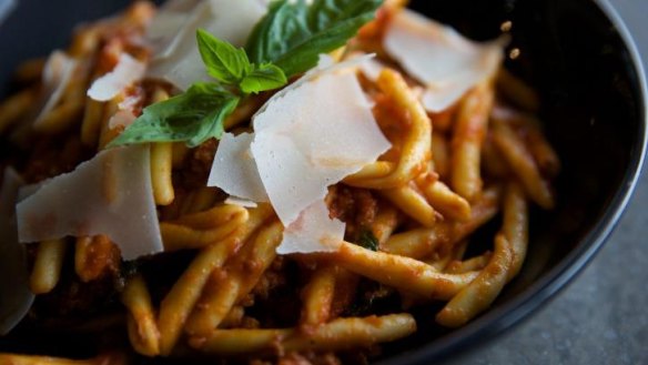 Twists of trofie pasta in tomato sugo.
