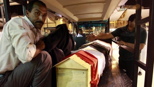 An Iraqi Shiite mourner looks on near the coffin of a soldier killed in the line of duty near Abu Ghraib, west of Baghdad, last week.