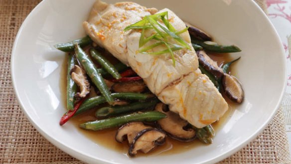 Healthy "red-cooked" fish with mushrooms and greens.