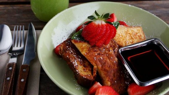 Brioche French toast and a green apple, pear, spinach cold-pressed juice.