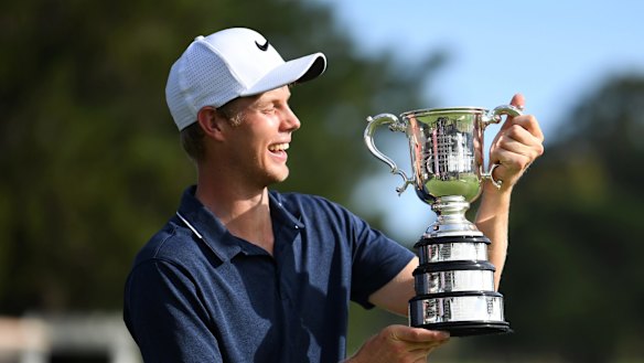 Unlikely triumph: Cameron Davis with the trophy.