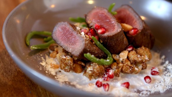 Mutton backstrap, macadamia milk, pomegranate and cauliflower at Gaslight Bistro, Brisbane. 