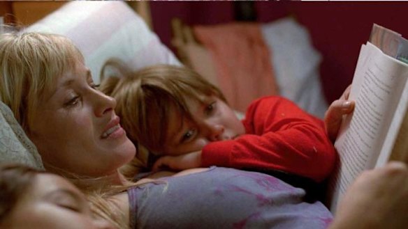 Let the growth begin... Single-mum Olivia (Patricia Arquette) reads a story to her son Mason (Ellar Coltrane) and daughter Samantha (Lorelei Linklater) at the start of <i>Boyhood</i>.