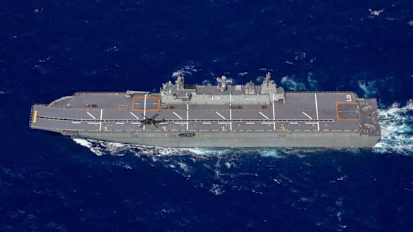 HMAS Adelaide sails in formation with the other task group ships while in transit to Hawaii to take part in Exercise RIMPAC 18.