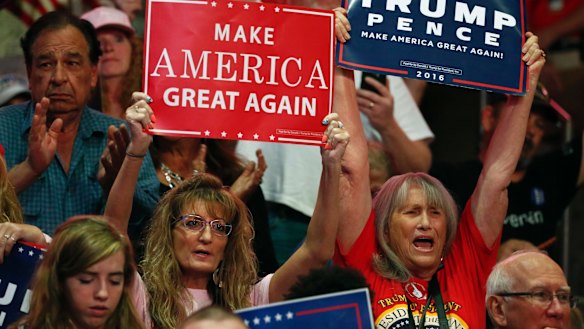 Supporters cheer as they wait for the arrival of Republican presidential candidate Donald Trump for a campaign rally in Colorado.