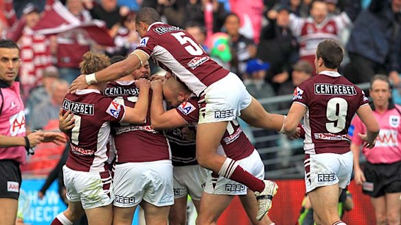 Manly celebrate after Brett Stewart goes over for the first try in the 2011 NRL Grand Final.