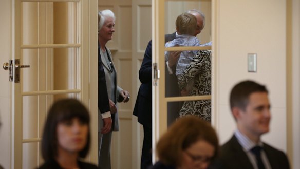Malcolm Turnbull kisses his grandson,  Jack,  moments before he was sworn in as Prime Minister at Government House on Tuesday.