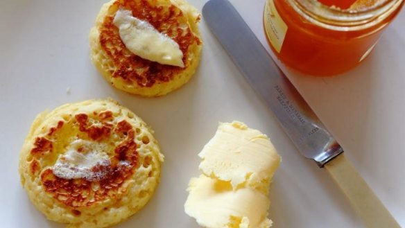 Golden and yeasty: Crumpets and honey. 