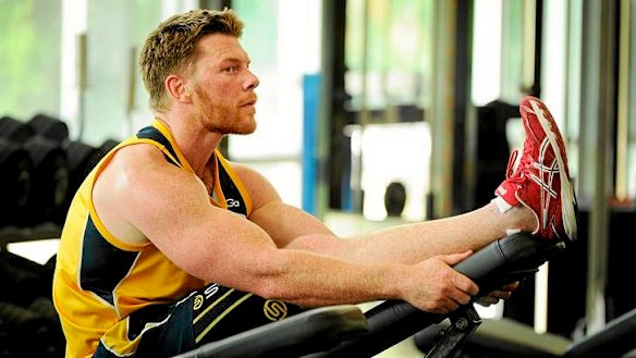 Brumbies winger Clyde Rathbone stretches his injured leg out at  Brumbies HQ in Grffith yesterday.