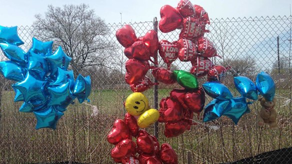 A makeshift memorial sits along a fence near where Robert Godwin Sr., was killed in Cleveland. 