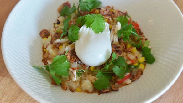 Savoury rice porridge and a poached egg.