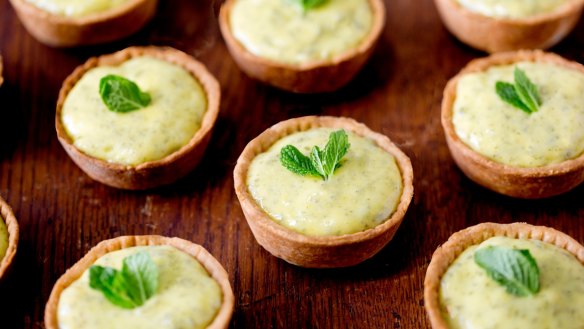 Mojito-inspired mini lime, mint and rum tarts.