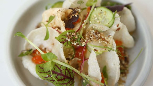 Prawn crackers, hummus and salmon roe.